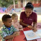 Browne Academy Photo #7 - Preschool Students with their 8th grade buddy.